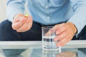 A man takes an effective antibiotic for prostatitis. 